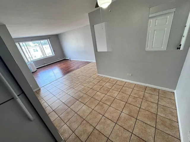 a view of an empty room and window