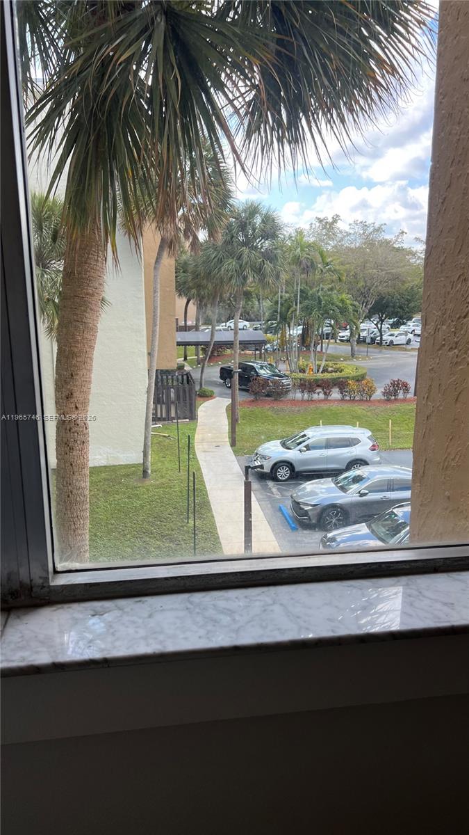 14250 Southwest 62nd Street, Unit 319 Miami, FL 33183 - Photo 22 of 29 a view of swimming pool with a balcony