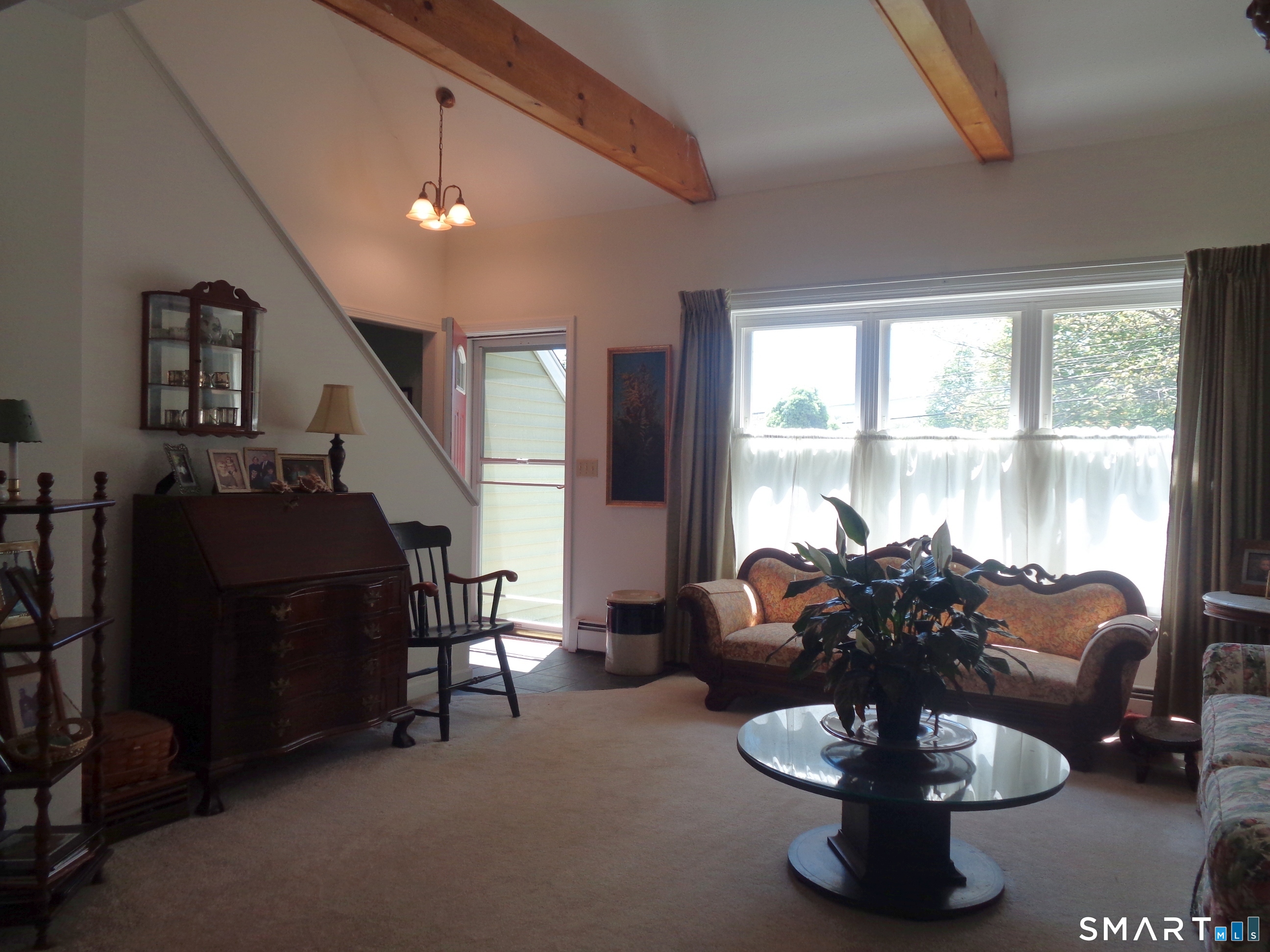 321 Spring Street Naugatuck, CT 06770 - Photo 5 of 27 a living room with furniture and a large window