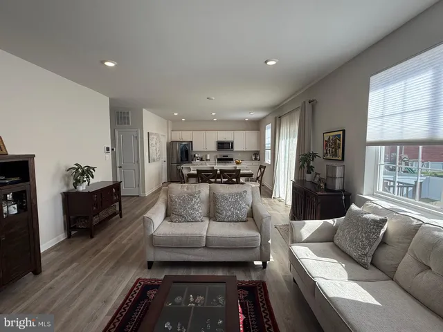a living room with furniture and a couch