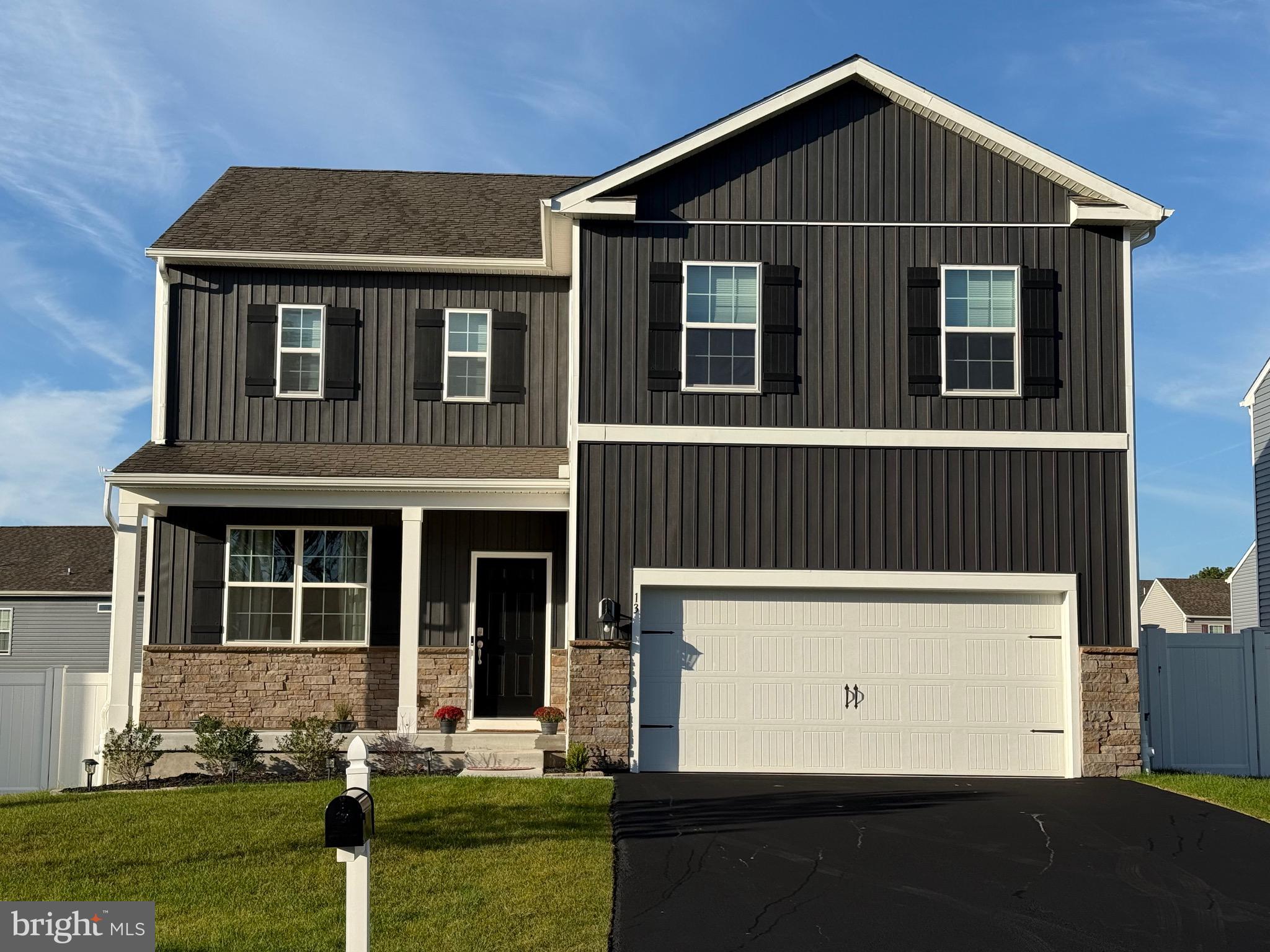 13 Outsail Avenue Barnegat, NJ 08005 - Photo 2 of 32 a front view of a house with a yard