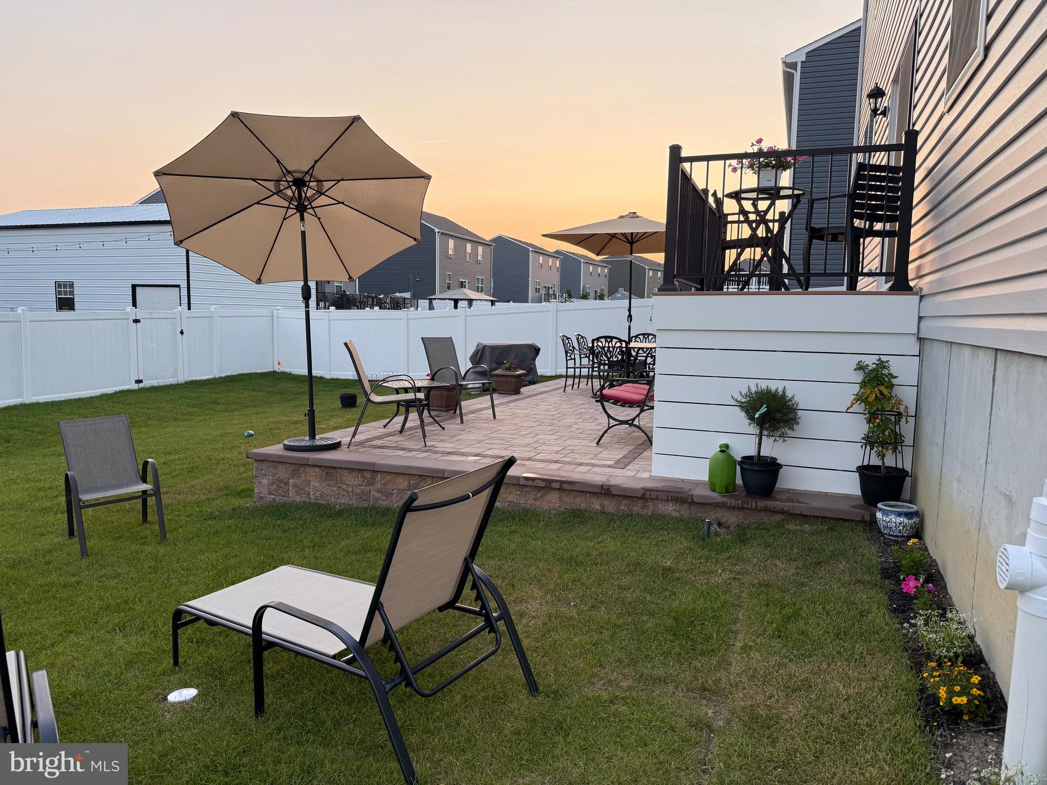 13 Outsail Avenue Barnegat, NJ 08005 - Photo 29 of 32 a view of a backyard with furniture and a table