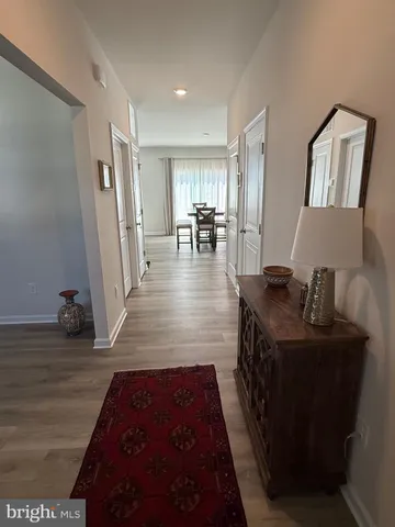 a view of a living room and dining room