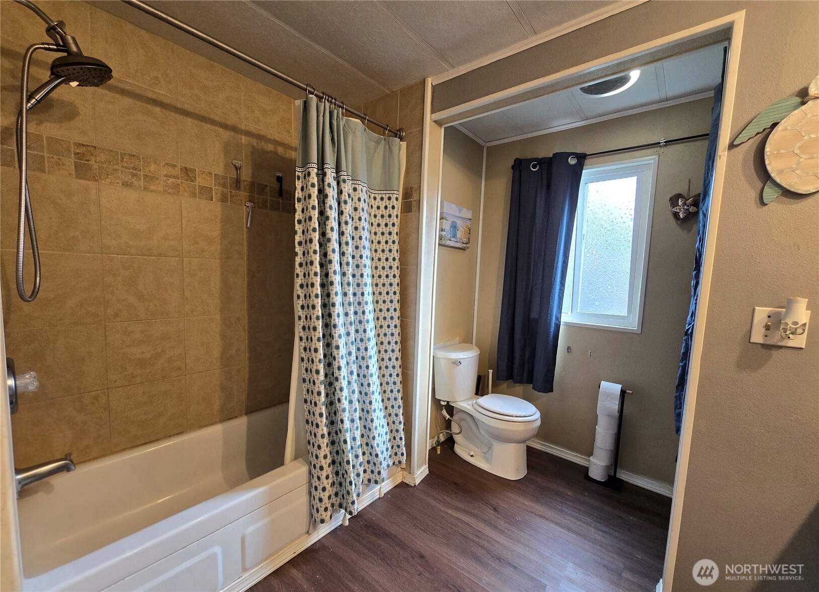 38 Hurd Road, Unit 35 Elma, WA 98541 - Photo 15 of 20 a bathroom with a toilet and a shower