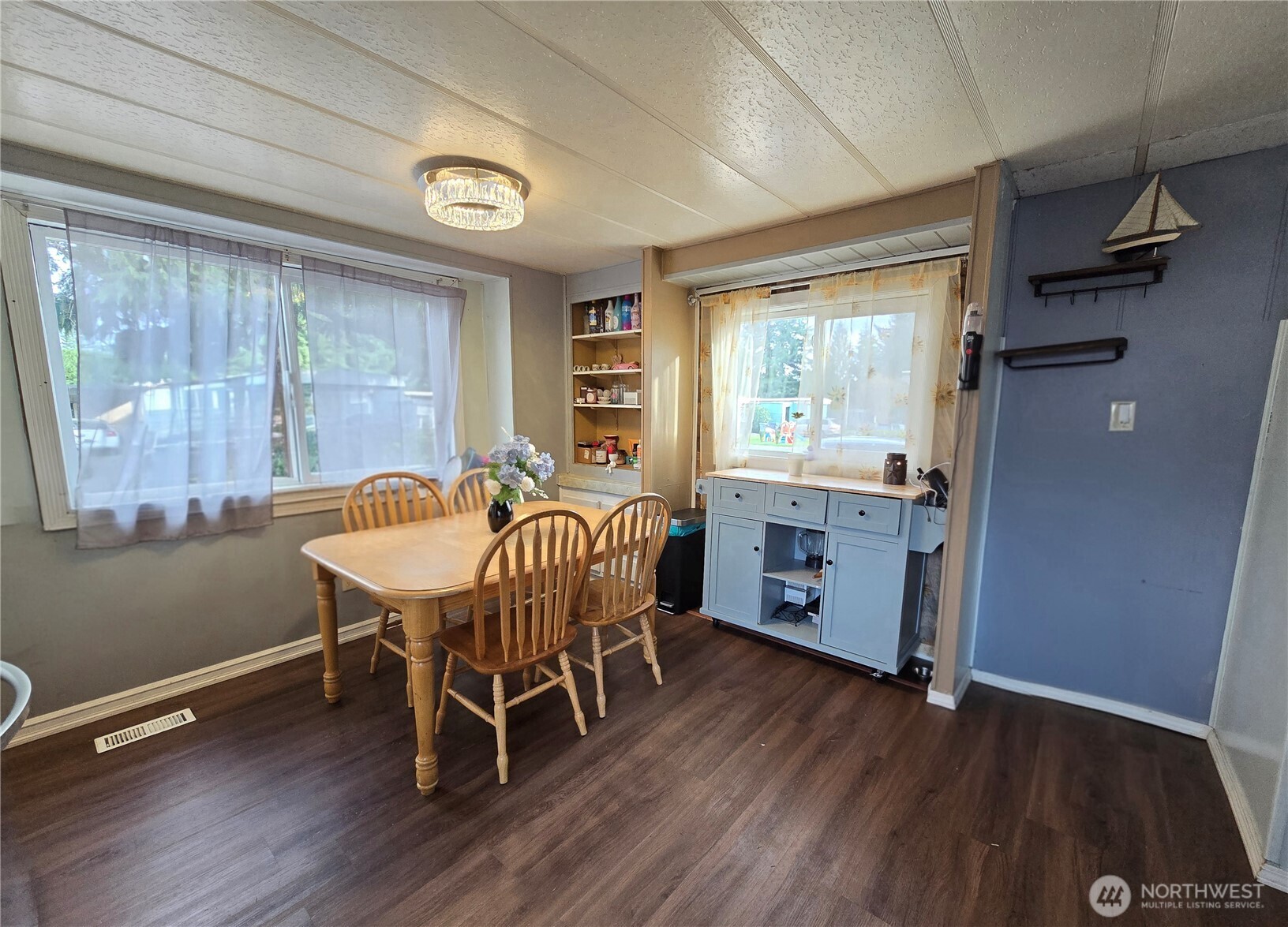 38 Hurd Road, Unit 35 Elma, WA 98541 - Photo 6 of 20 a dining room with furniture window wooden floor