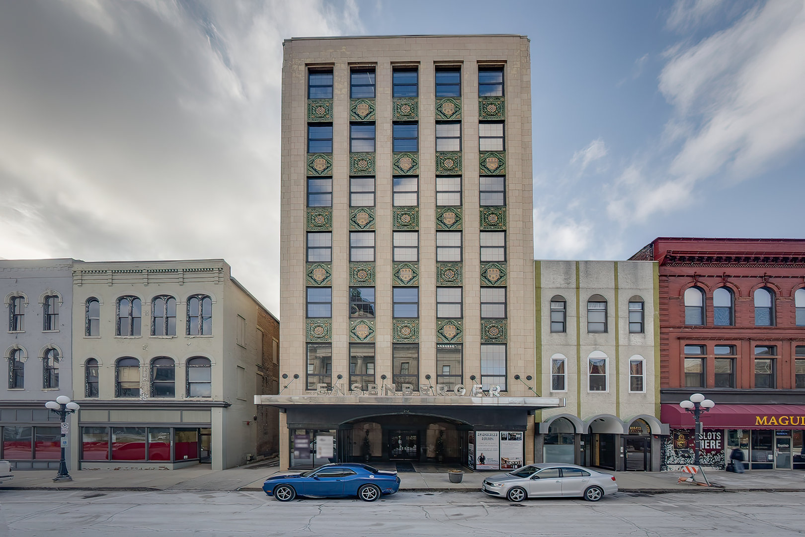 a front view of a building with lot of windows