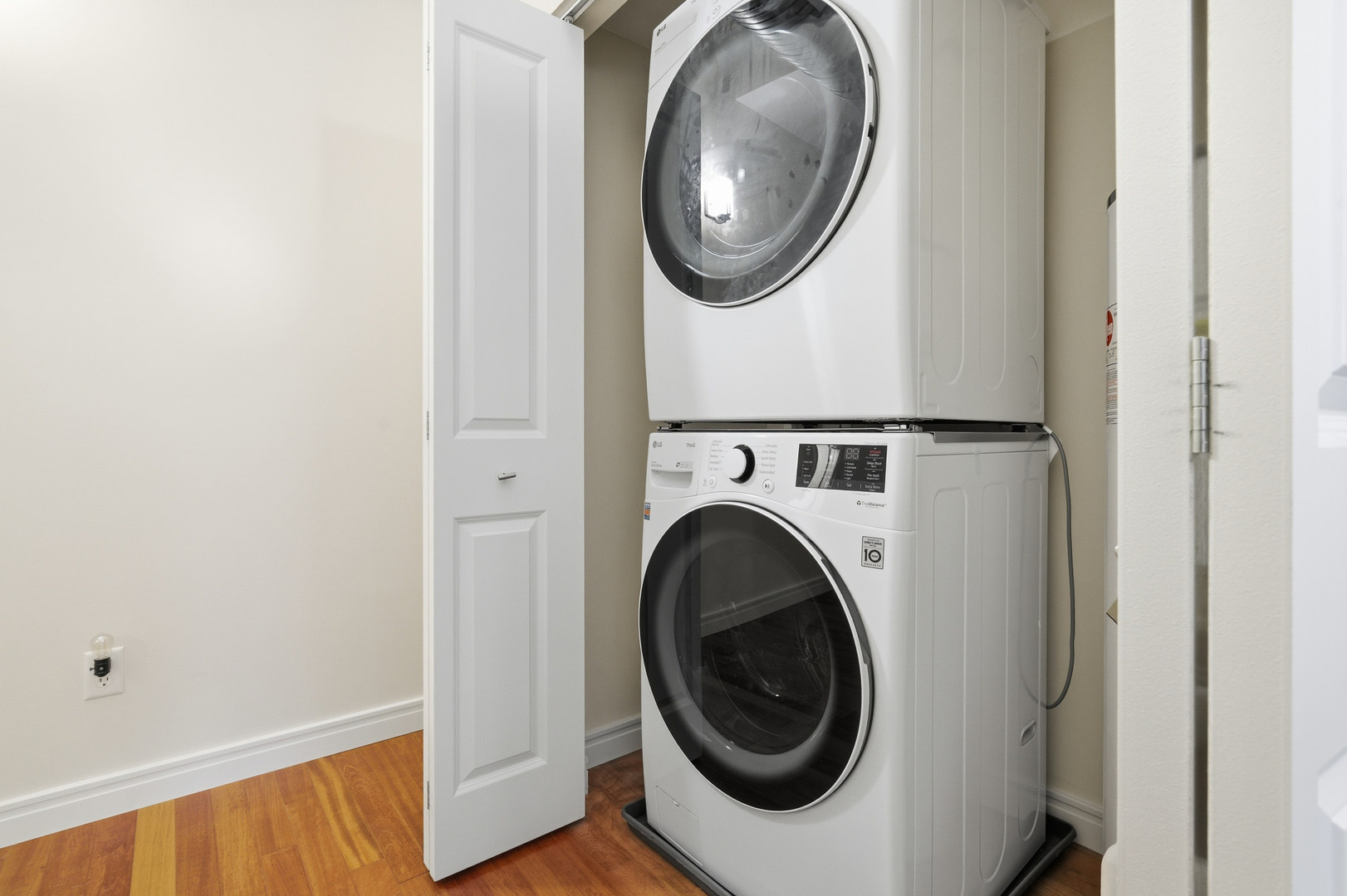 212 North Center Street, Unit 301 Bloomington, IL 61701 - Photo 11 of 39 a view of a hallway with washer and dryer