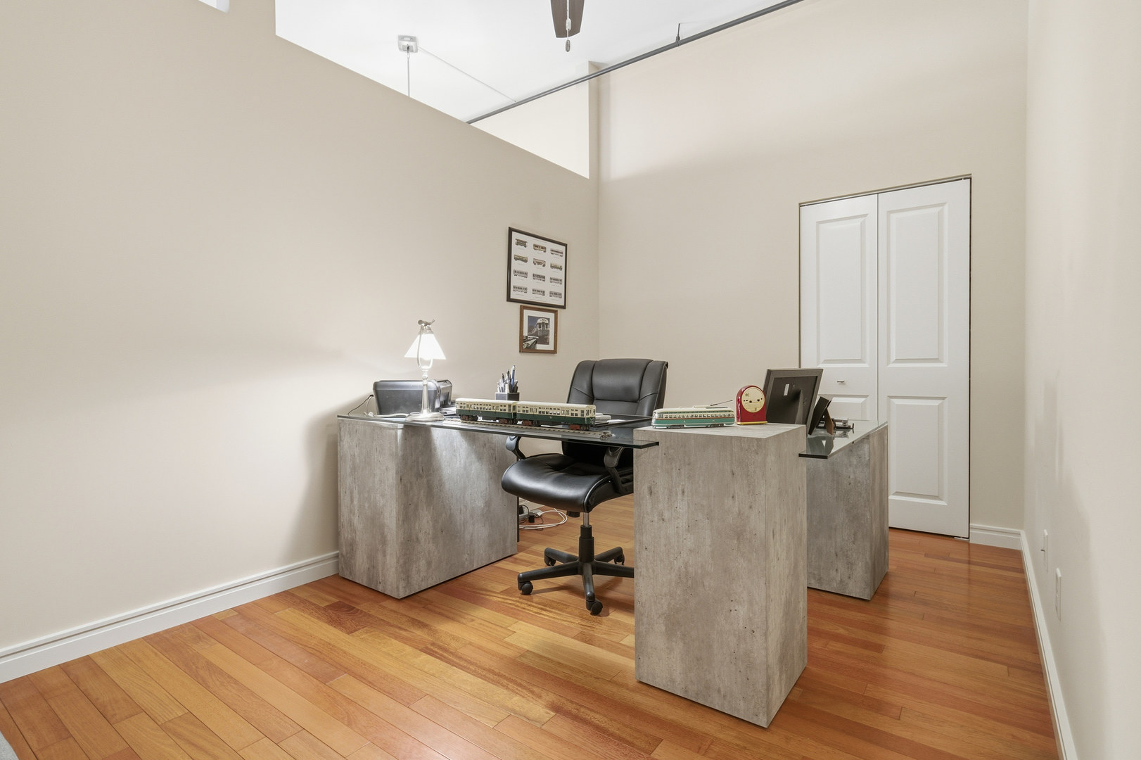 212 North Center Street, Unit 301 Bloomington, IL 61701 - Photo 13 of 39 a view of workspace with wooden floor