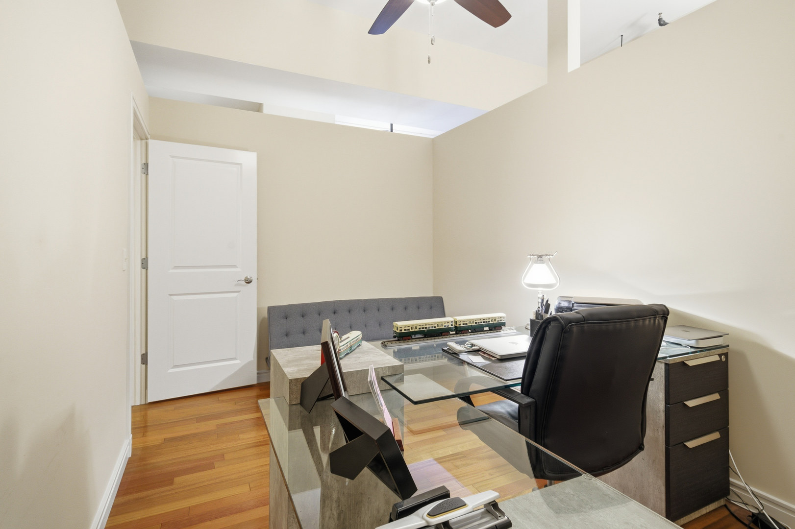 212 North Center Street, Unit 301 Bloomington, IL 61701 - Photo 14 of 39 a view of a workspace with furniture