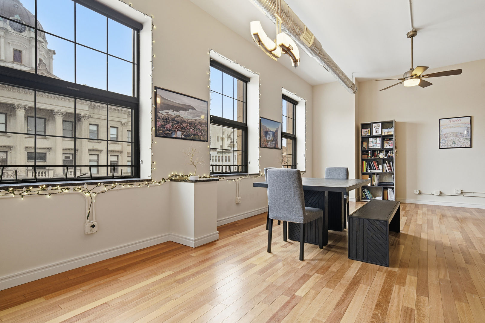 212 North Center Street, Unit 301 Bloomington, IL 61701 - Photo 23 of 39 a view of a workspace with furniture and a window