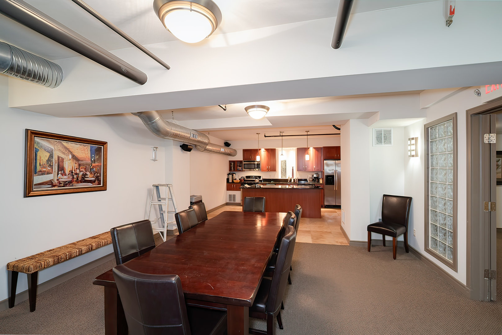 212 North Center Street, Unit 301 Bloomington, IL 61701 - Photo 35 of 39 a dining room with furniture and a rug