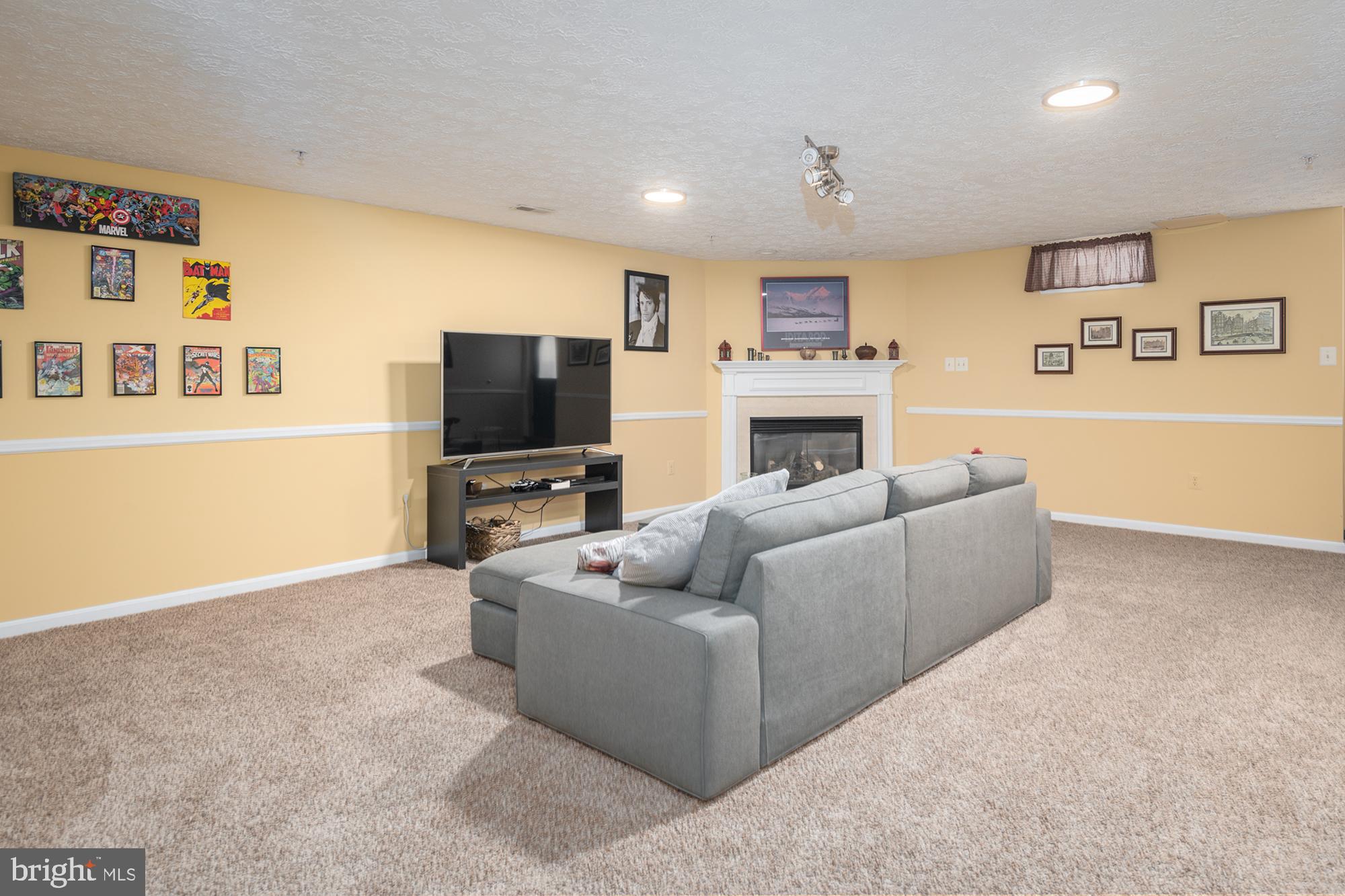 2152 Kyle Green Road Abingdon, MD 21009 - Photo 29 of 38 Lower leve rec room with cozy fireplace