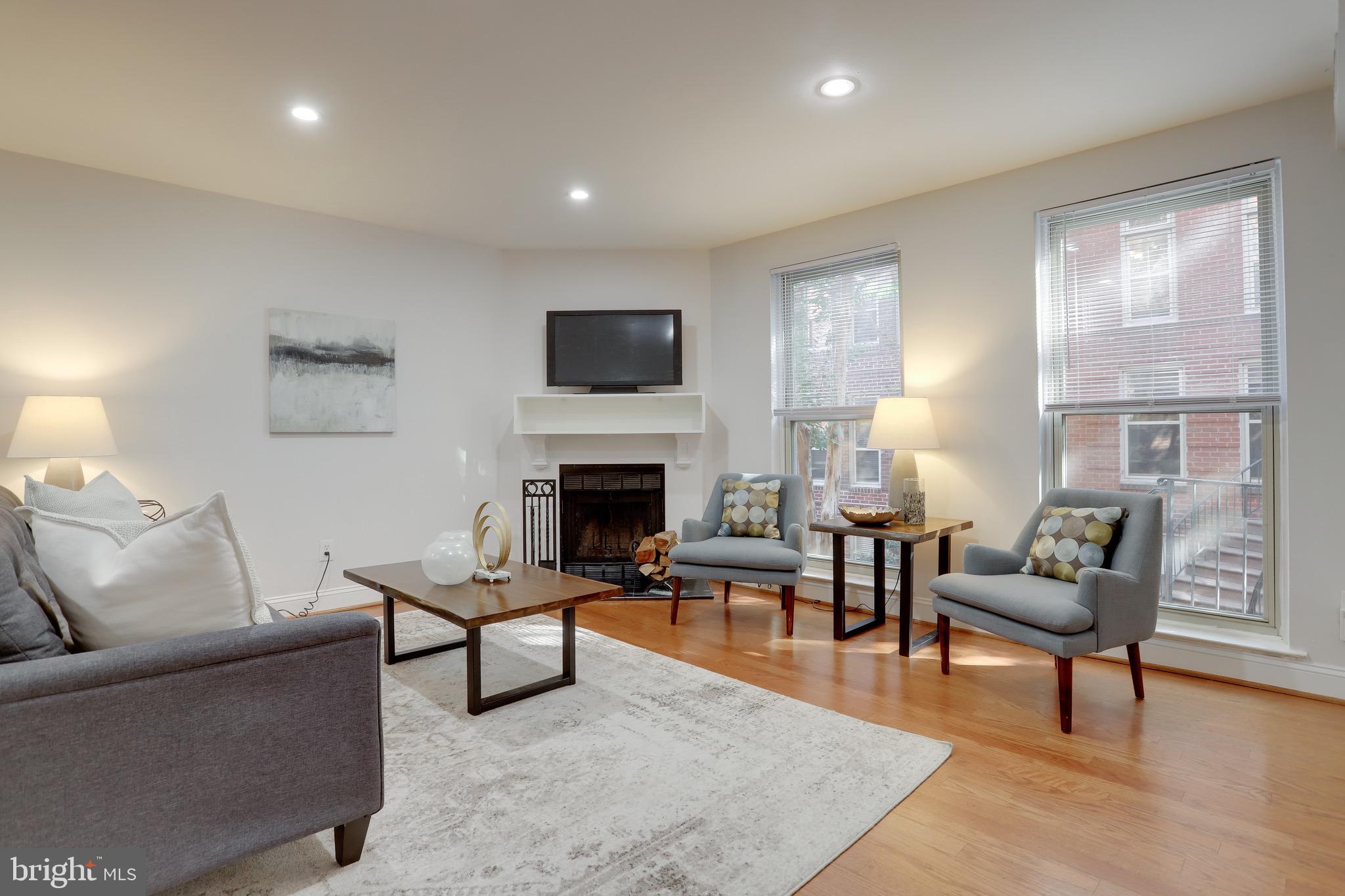 1437 A Street Northeast, Unit 1437 Washington, DC 20002 - Photo 12 of 46 Features a wood burning fireplace