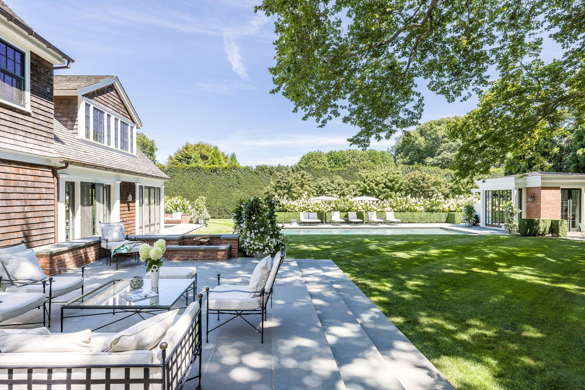 43 Lee Avenue East Hampton, NY 11937 - Photo 11 of 49 a house view with outdoor seating space