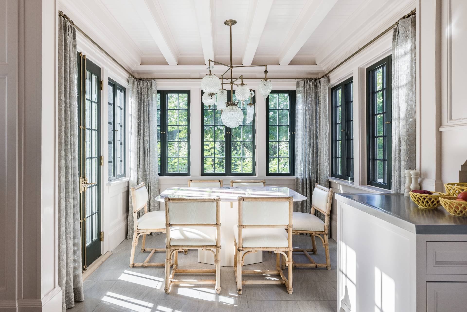 43 Lee Avenue East Hampton, NY 11937 - Photo 25 of 49 a view of a dining room with furniture large windows and wooden floor