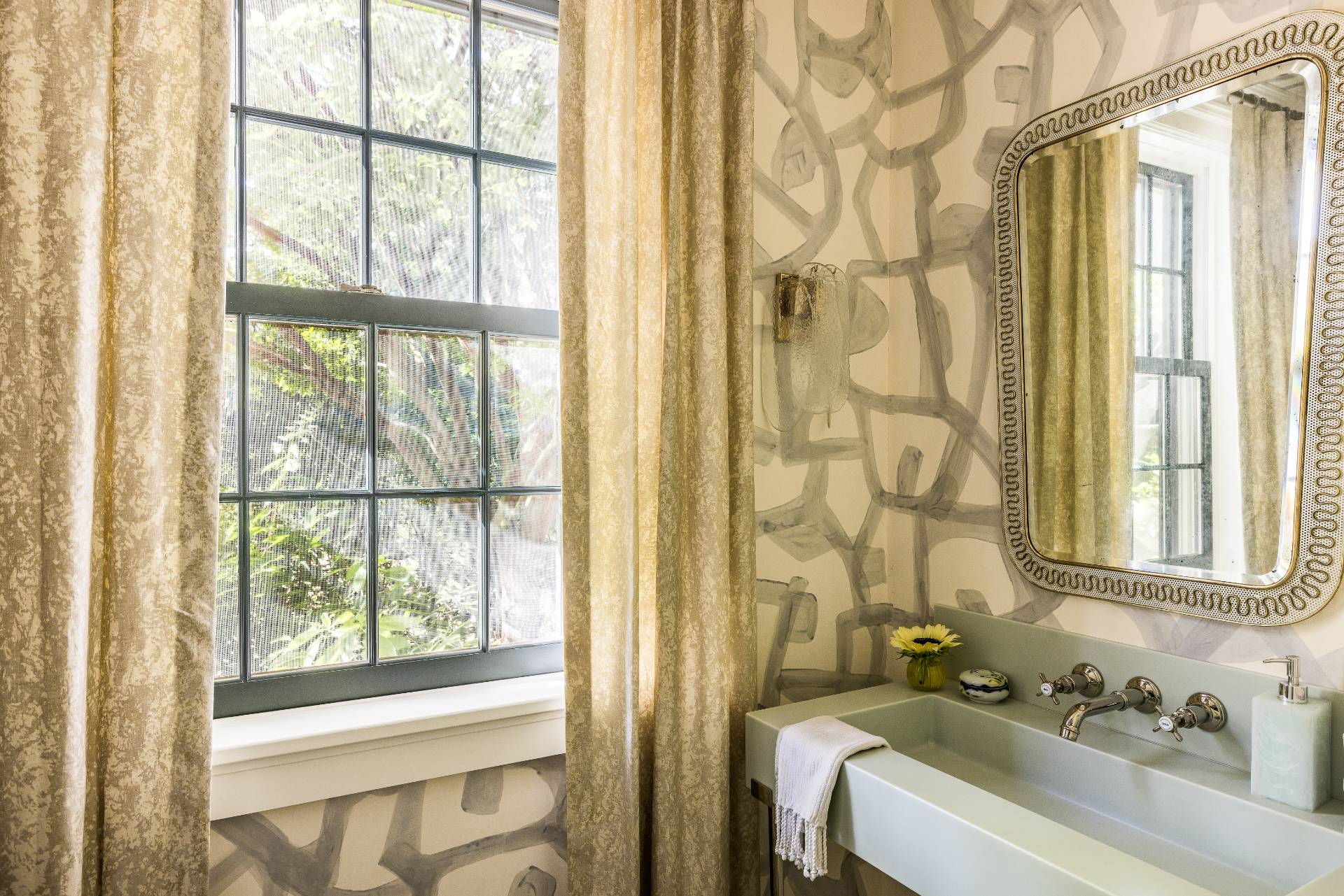 43 Lee Avenue East Hampton, NY 11937 - Photo 29 of 49 a bathroom with a sink and a bathtub next to a window