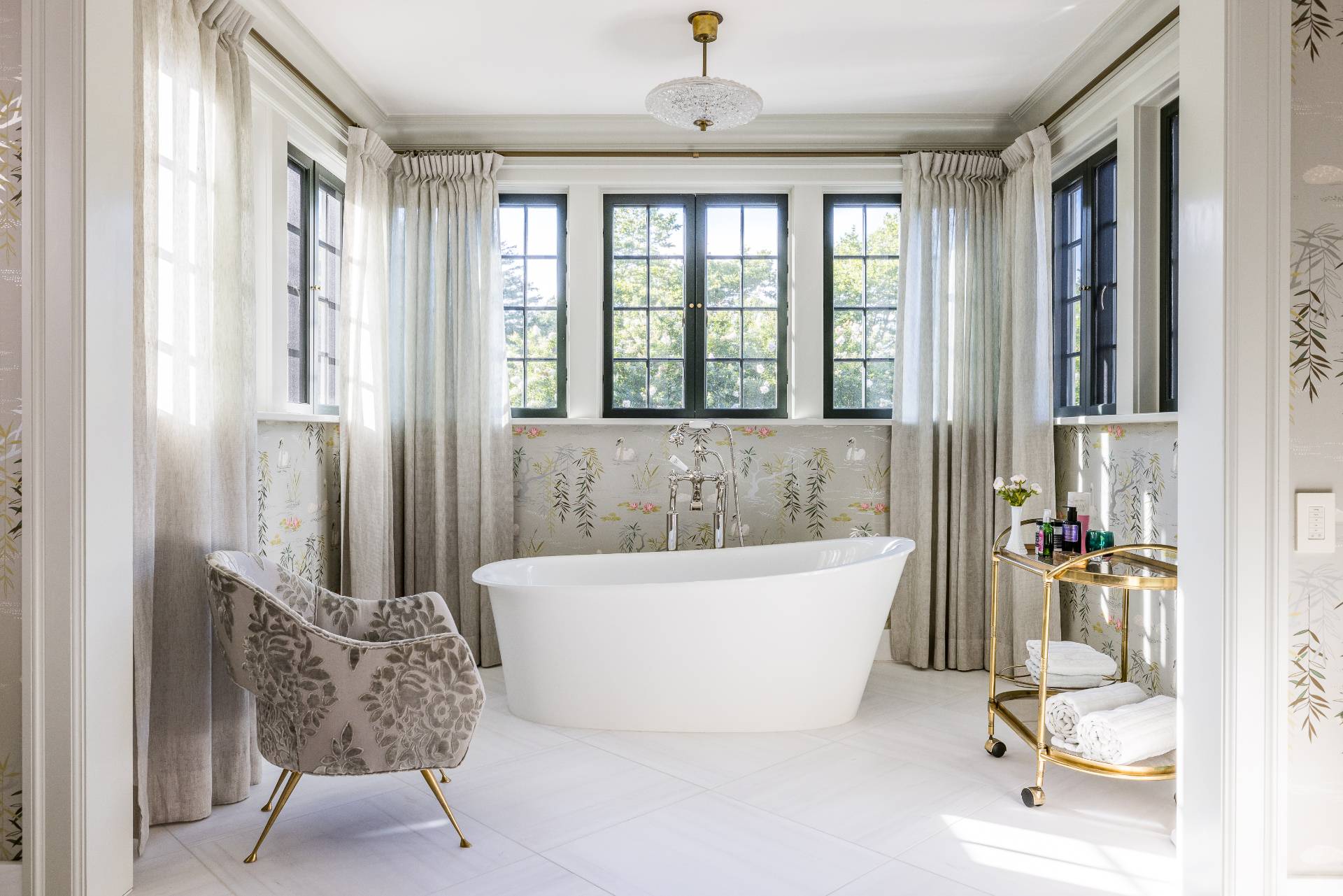 43 Lee Avenue East Hampton, NY 11937 - Photo 36 of 49 a bath tub sitting in a bathroom next to a window