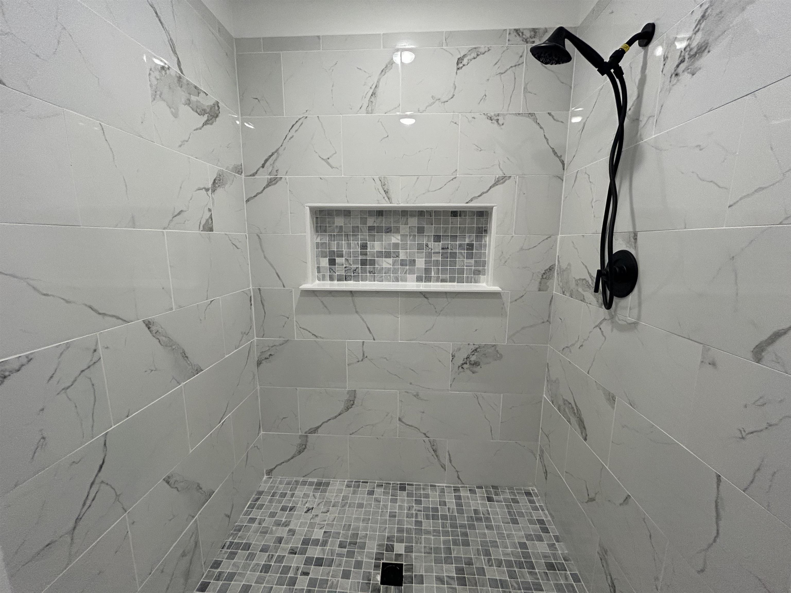 35 Grapevine Cove Counce, TN 38326 - Photo 11 of 25 a bathroom with a shower