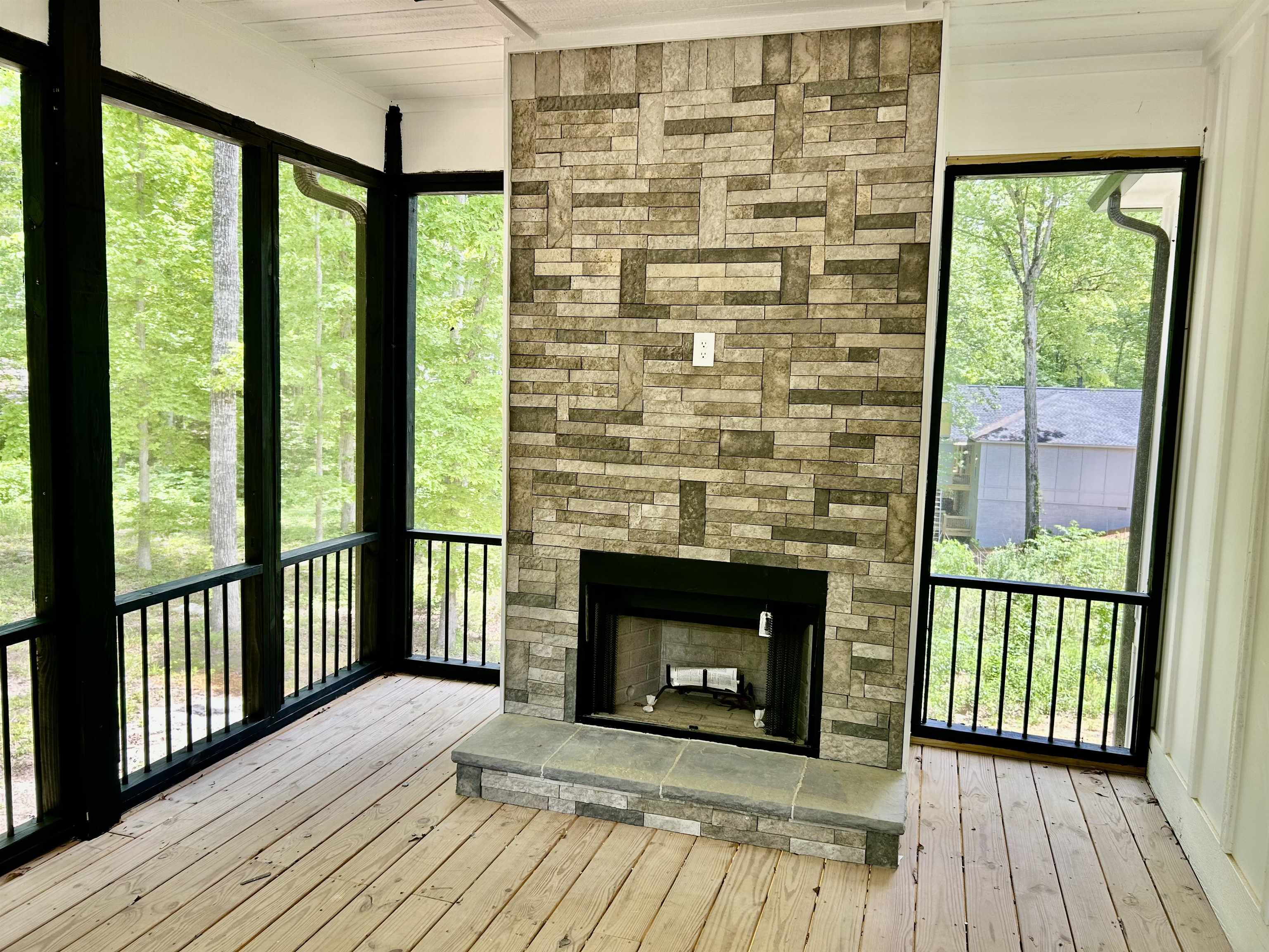 35 Grapevine Cove Counce, TN 38326 - Photo 21 of 25 a view of livingroom with wooden floor and fireplace