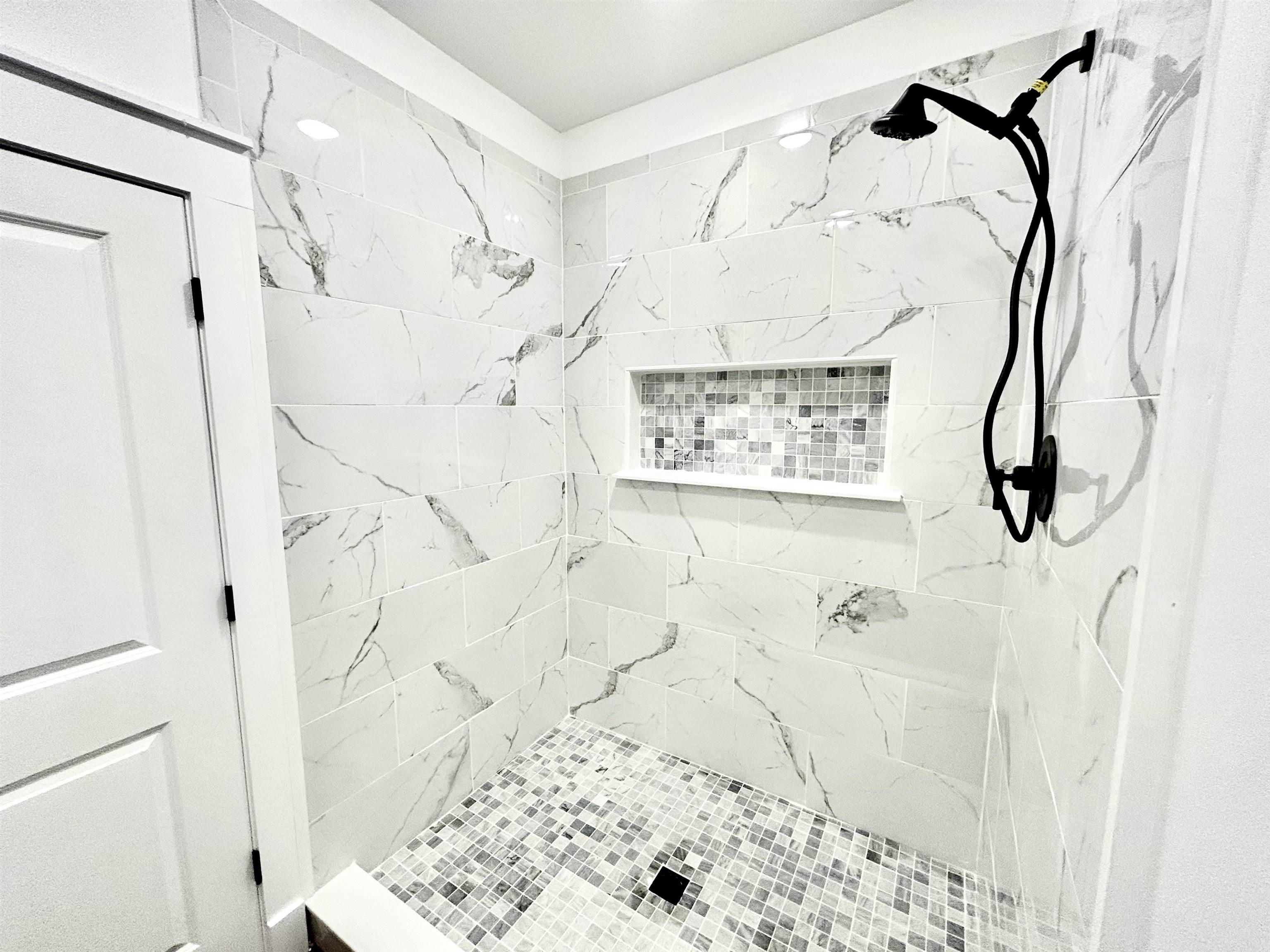 35 Grapevine Cove Counce, TN 38326 - Photo 9 of 25 a bathroom with a shower