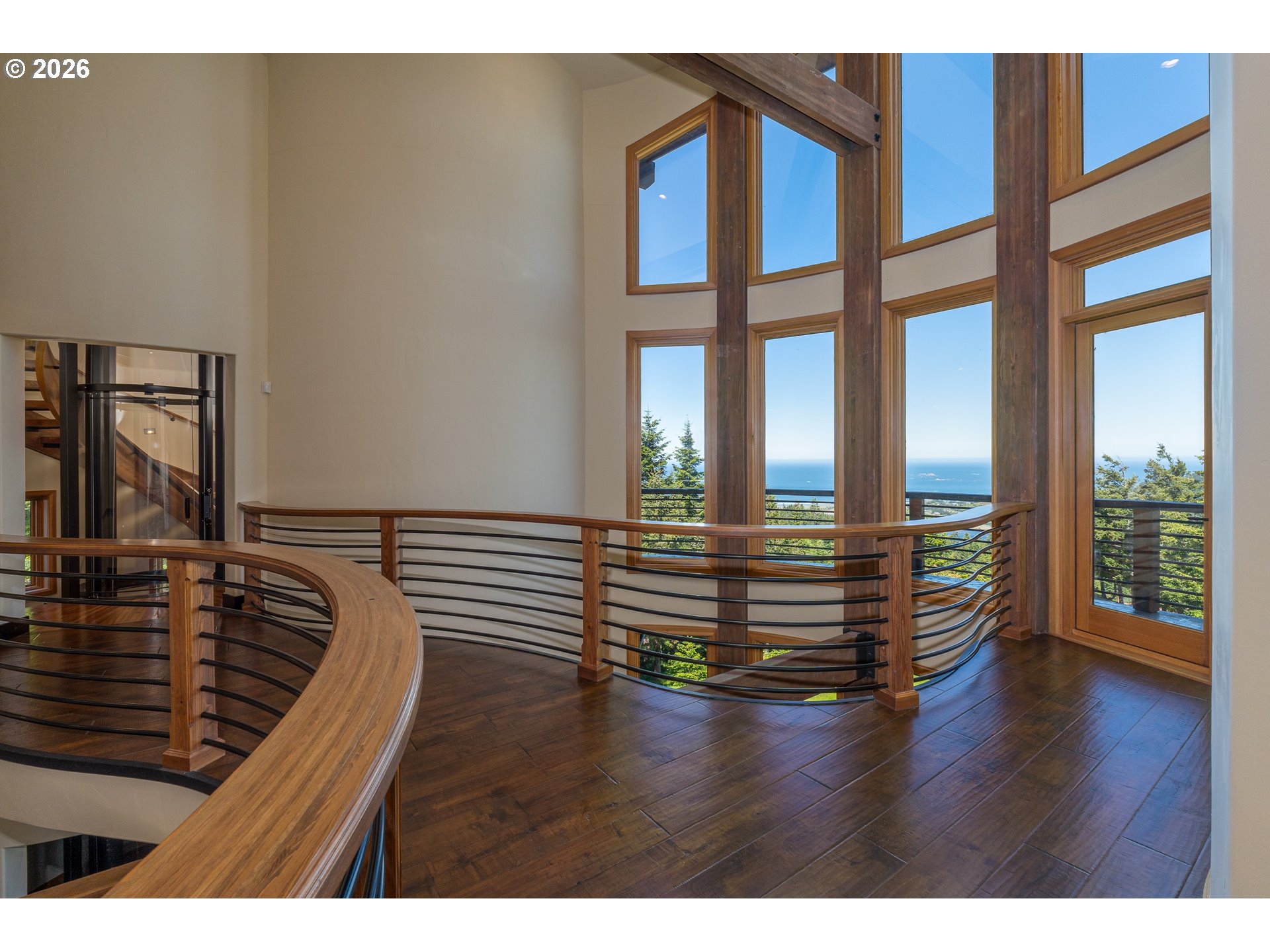 94880 Grizzly Mountain Road Gold Beach, OR 97444 - Photo 22 of 48 a view of entryway and hall with wooden floor