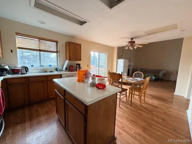 a bathroom with a sink toilet and mirror