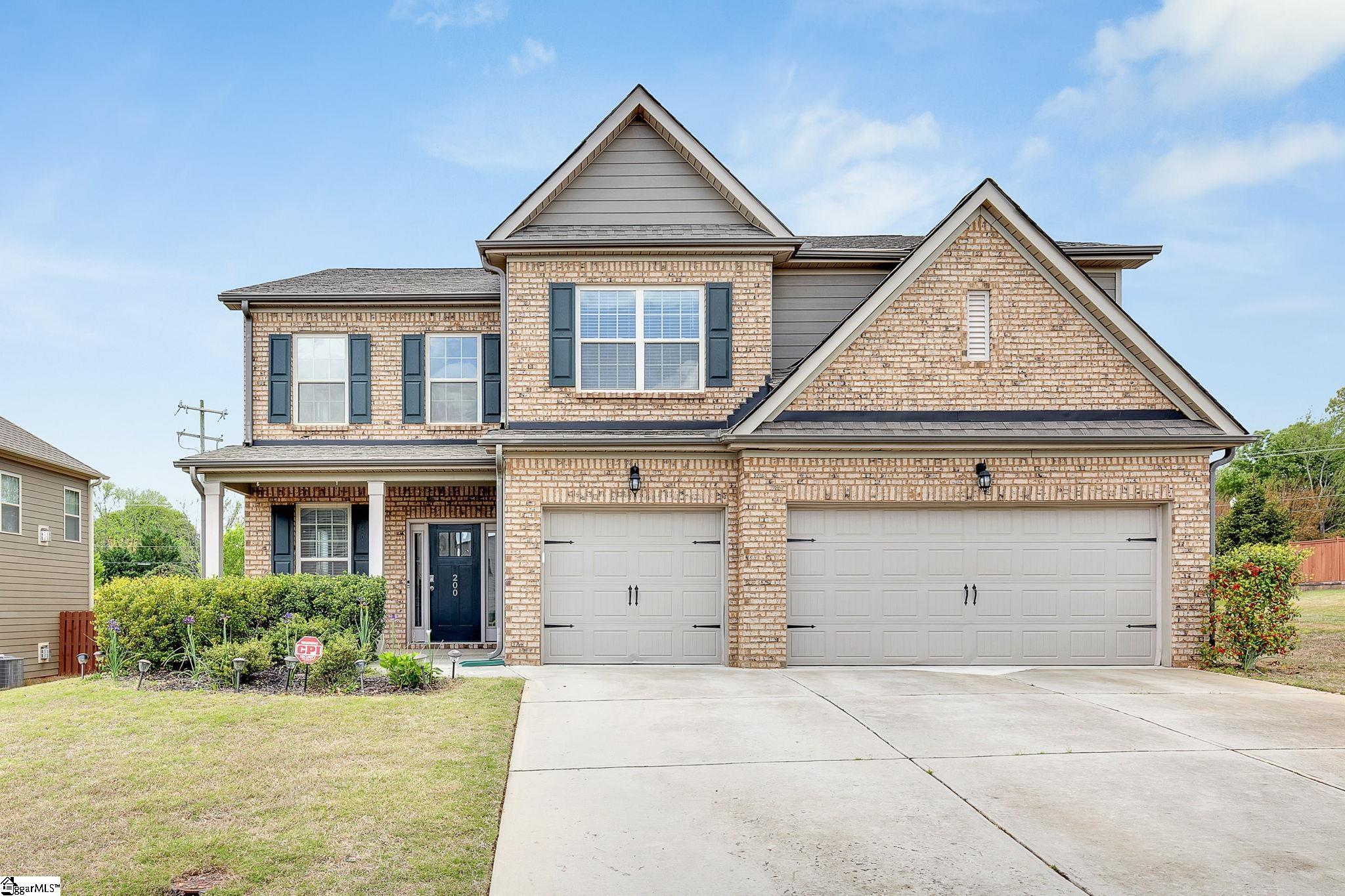 Great curb appeal welcomes you home each and every time!  Nicely landscaped, great front porch and a 3 car garage.