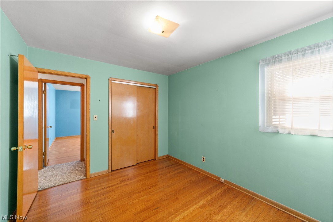 7228 Maplewood Road Parma, OH 44130 - Photo 16 of 30 Unfurnished bedroom featuring light hardwood floors
