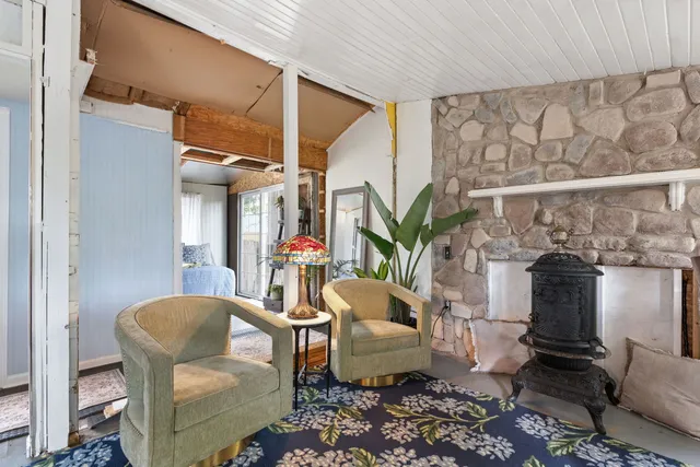 a outdoor living space with furniture and a potted plant