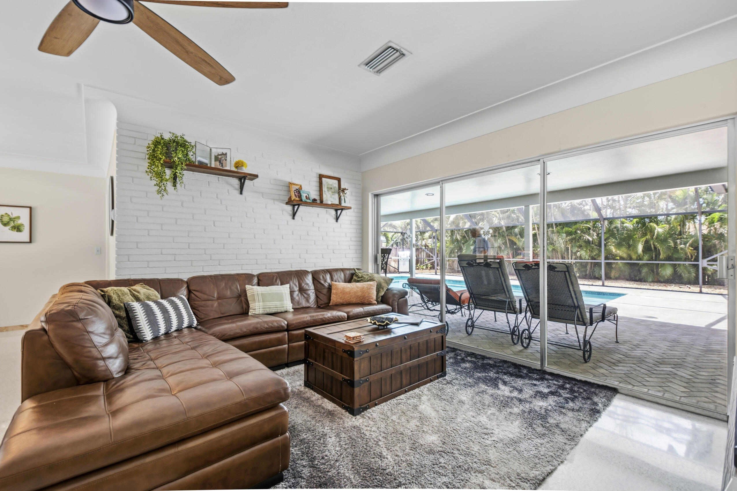 1348 Southwest 4th Street Boca Raton, FL 33486 - Photo 3 of 44 a living room with furniture and a large window