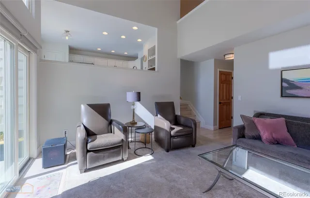 a living room with furniture and a couch