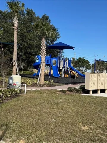 a house with trees in the background