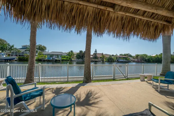 a view of a lake with a sitting area