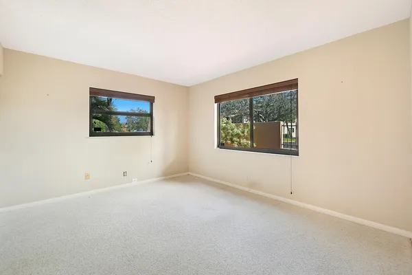 an empty room with windows