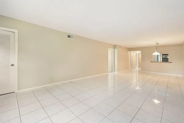 a view of an empty room and window