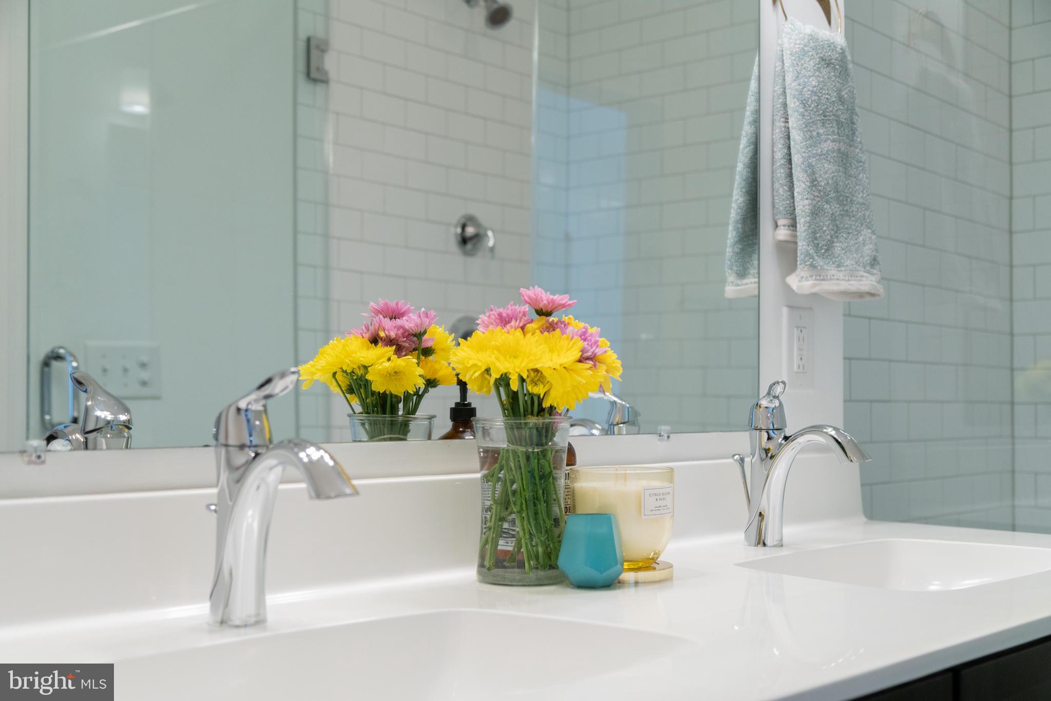 159 East Allen Street, Unit 1 Philadelphia, PA 19125 - Photo 39 of 45 a bathroom sink with a mirror