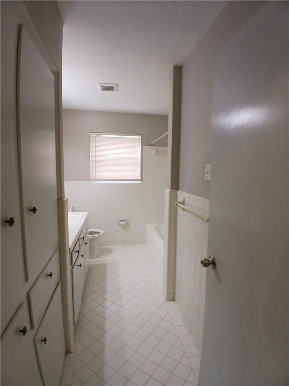 4713 South Shea Parkway Corpus Christi, TX 78413 - Photo 5 of 9 a bathroom with a bathtub and a shower