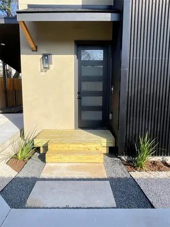a view of swimming pool with a patio