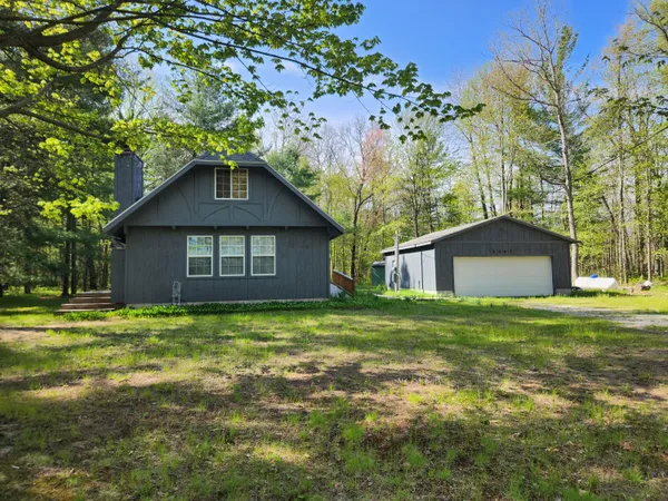 $274,900 | 1041 Wolf Lake Drive, Baldwin, MI 49304