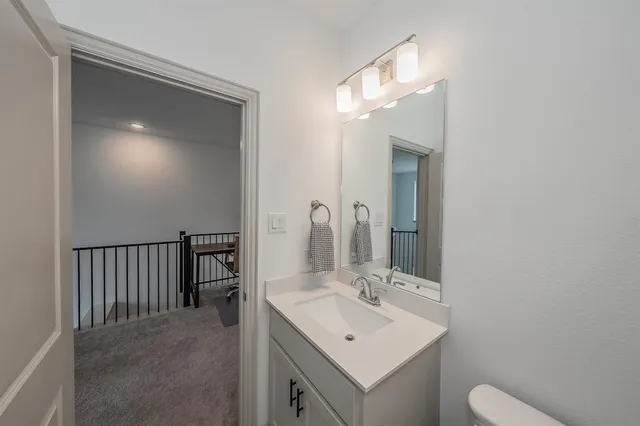 a front view of a house with garage