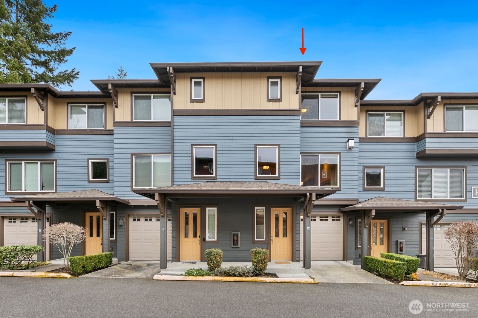 a front view of a building with a street