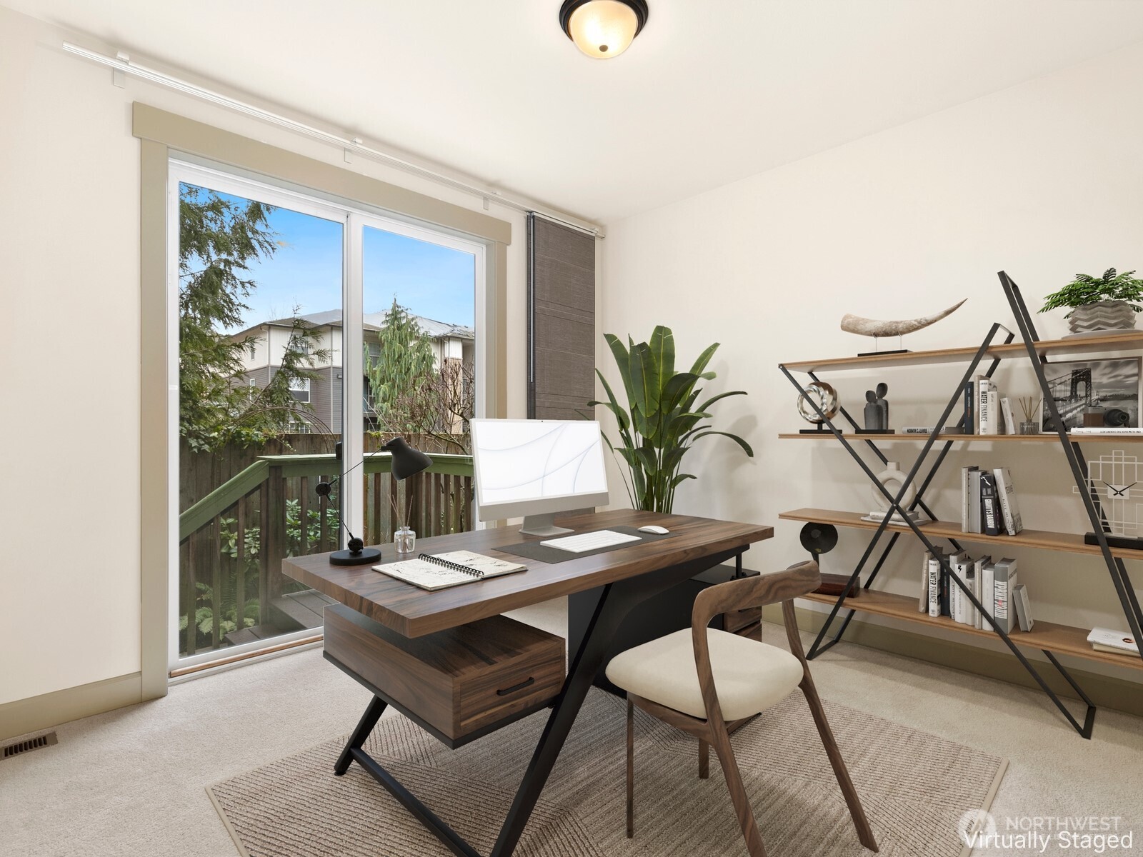 2115 201st Place Southeast, Unit H3 Bothell, WA 98012 - Photo 11 of 37 a view of a workspace with a table and chair in a room