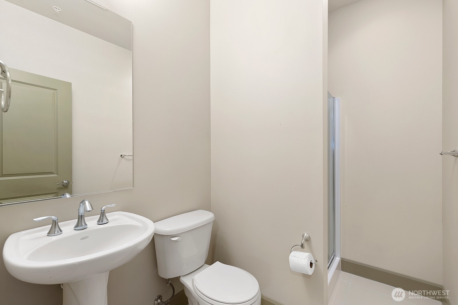2115 201st Place Southeast, Unit H3 Bothell, WA 98012 - Photo 13 of 37 a bathroom with a toilet a sink and mirror
