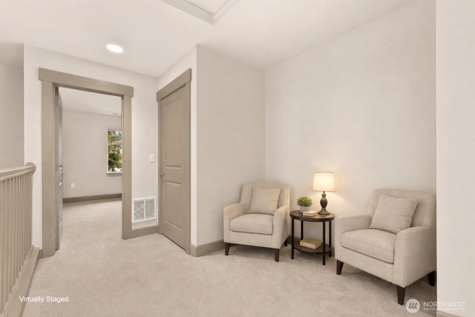 2115 201st Place Southeast, Unit H3 Bothell, WA 98012 - Photo 23 of 37 a living room with furniture and a lamp