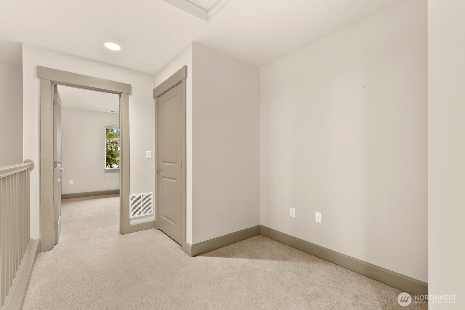2115 201st Place Southeast, Unit H3 Bothell, WA 98012 - Photo 25 of 37 an empty room with mirror in it