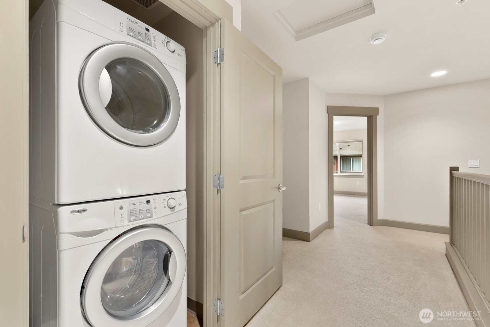 2115 201st Place Southeast, Unit H3 Bothell, WA 98012 - Photo 27 of 37 a view of a hallway with washer and dryer
