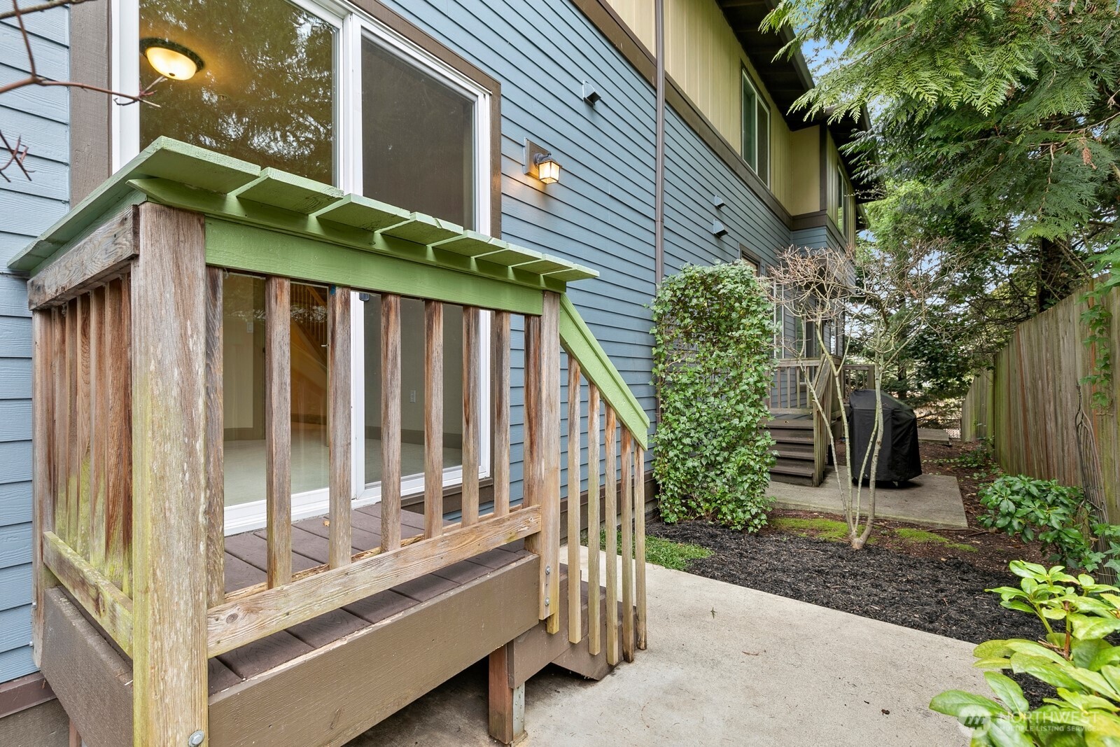 2115 201st Place Southeast, Unit H3 Bothell, WA 98012 - Photo 28 of 37 a front view of a house with a yard