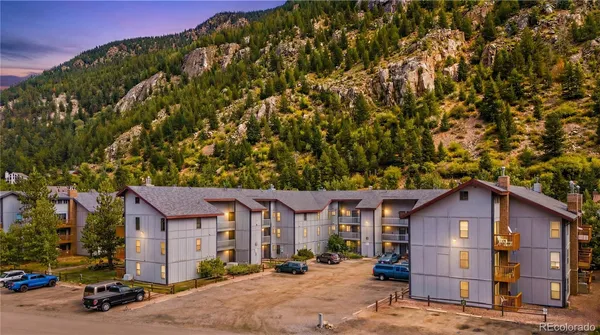 a view of a porch with wooden floor and outdoor space