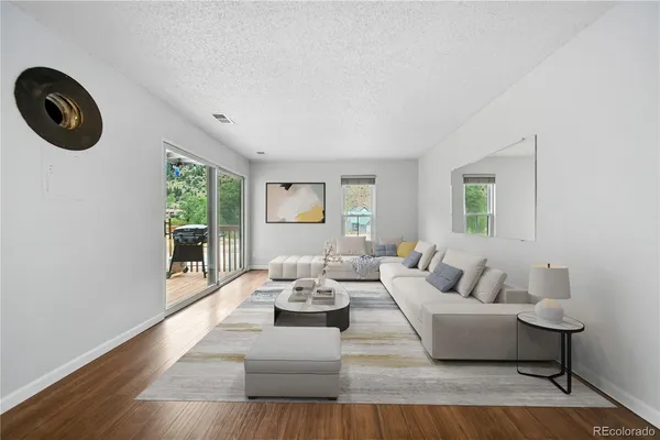 a kitchen with stainless steel appliances granite countertop a stove and a refrigerator