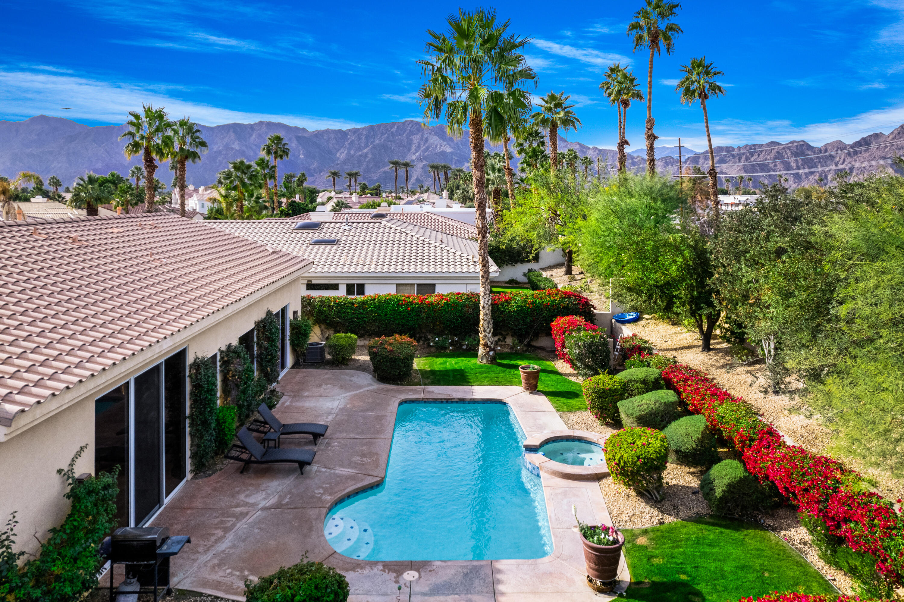 79060 River Rock Road La Quinta, CA 92253 - Photo 1 of 36 a view of a backyard with a patio